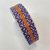 Tassenband Lichtgrijs, paars, oranje  40mm €5,00 p/m 